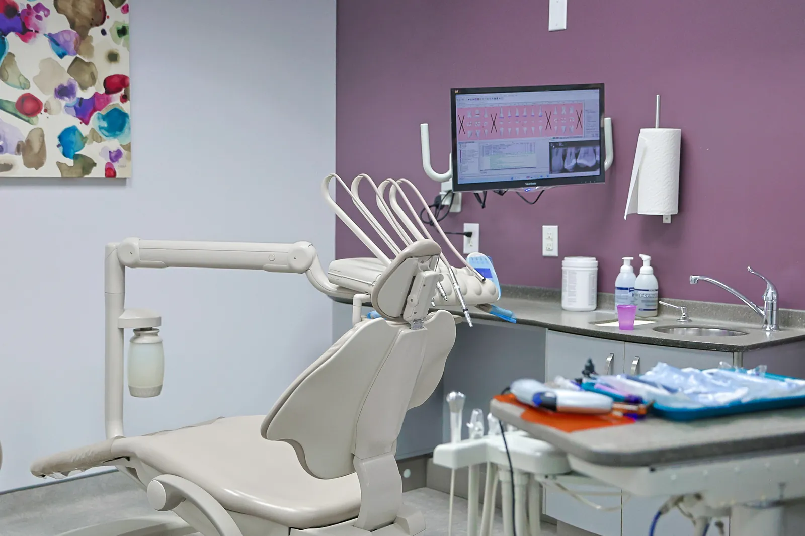 A dental chair and instruments ready for a patient at Amherstburg Dental